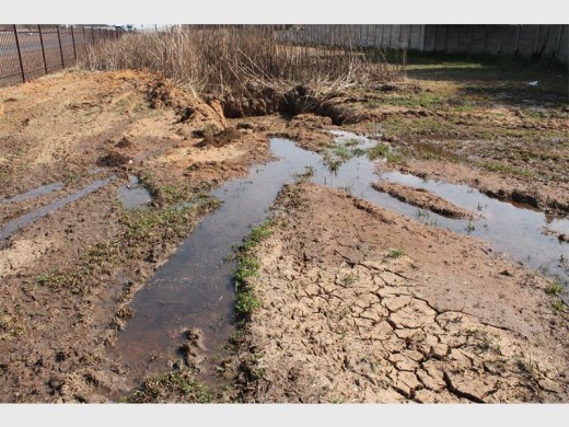 More than a month ago Ekurhuleni Metro contractors were on site in an attempt to repair the pipe. However, they left the site without finishing the job.