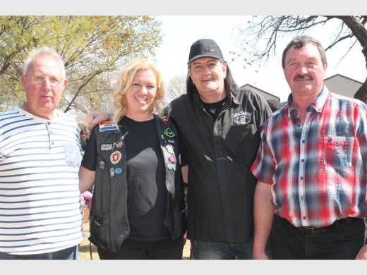 The band members of Profile, who provided entertainment on the day, with the organiser of the charity event, Bianca Santana (second from left). The musicians are (from left): Johan Fish, Jason Clark and Willem Kruger.