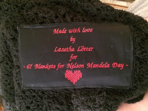 Lazetha Lötter, with the knitted portrait blanket of Madiba.