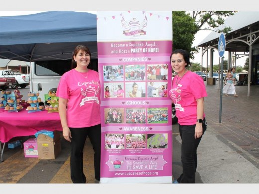 Dawn Viljoen and Michelle Larsen show their support for children with cancer.