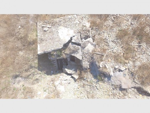 Police and community members are continuing the massive search for the girl who was, on Sunday, September 25, reported to have been abducted, gang-raped and thrown down this abandoned mineshaft in the Angelo informal settlement. Photo: E-Track.