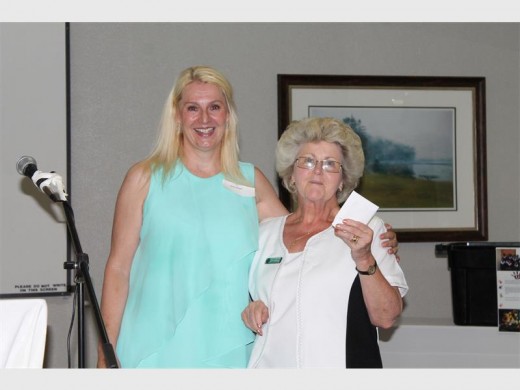 Invited guest speaker Silke Kaiser (left) generously donated her token of appreciation money she received from the East Rand Business Women, towards supporting the Boksburg SPCA. Accepting the money here, was Laraine Webb from the Boksburg SPCA.