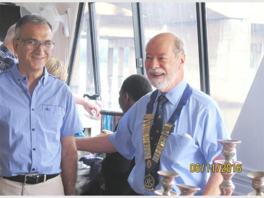 Speaker of the Rotary Foundation, past district governor Greg Stathacopoulos (left), sharing a joke with Boksburg Lake president Nicky Savvides.