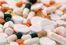 Image of pills and capsules of various sizes and colours