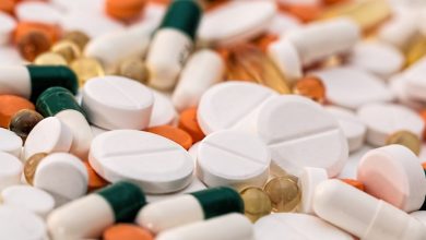 Image of pills and capsules of various sizes and colours
