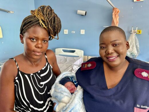 In this photo are Laurina Felisberto and Sr RM Sethobya with baby Felisberto.