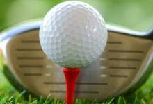 Golf ball on a tee