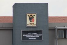 City of Ekurhuleni building with the city's logo on the wall