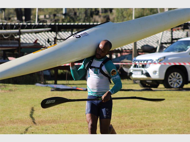 He won the men's K1 race in 01:38:00.
