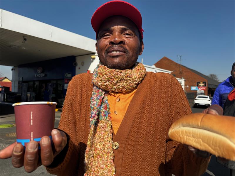 Dozens in need received warm food and winter scarves thanks to a partnership aimed at spreading warmth beyond fuel pumps.