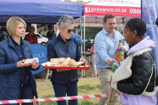 At the Boksburg Civic Centre, various local businesses converged on the lawn where they, in celebration of Mandela Day, handed out food to the needy.