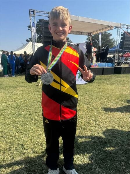 He clocked 05:00.5 for second place in the U11 to U13 boys' mile.