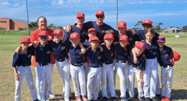 The Boksburg Cardinals U8 players pose for a group photo after winning the a league.