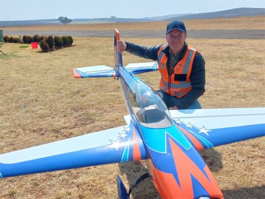 Posing next to his airplane is Pierre Du Plessis of Centurion.