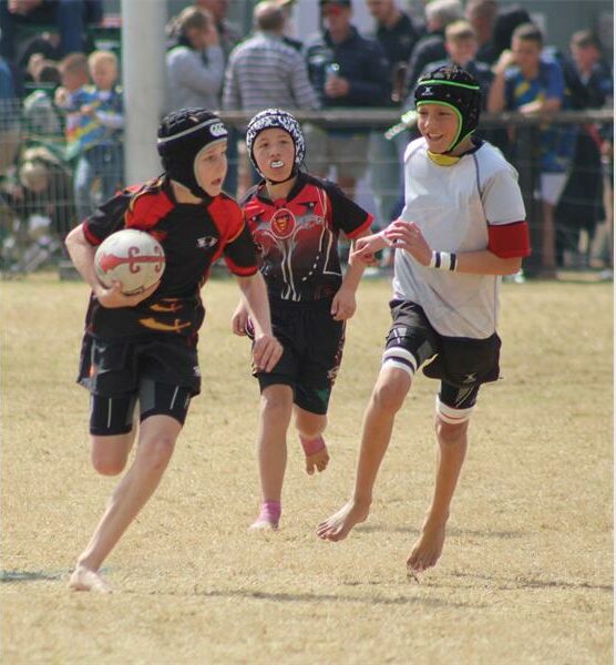 Ryan Koekemoer carries the ball on his way to the try line.