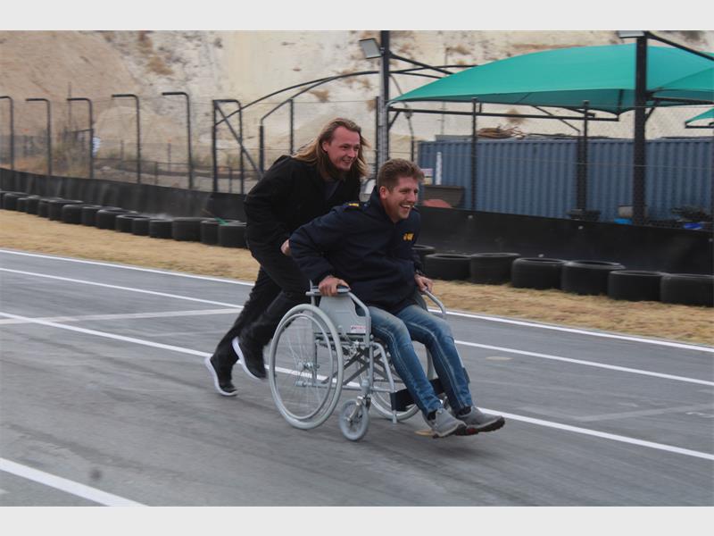 The race was held to raise funds to supply mobility equipment to people in need.