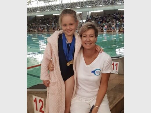 Swimming instructor.