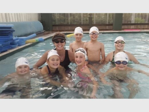 Children in a swimming pool.