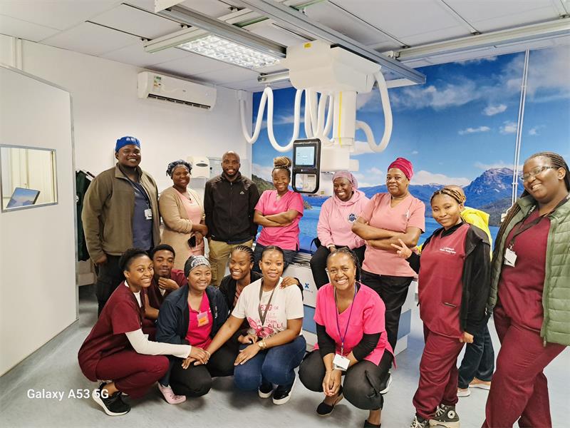 Tambo Memorial Hospital healthcare team posing in front of the newly installed digital X-ray system.