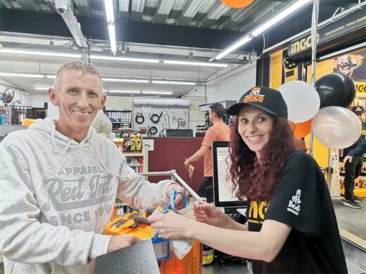 A cashier helping a customer at a till of a hardware in Witfield