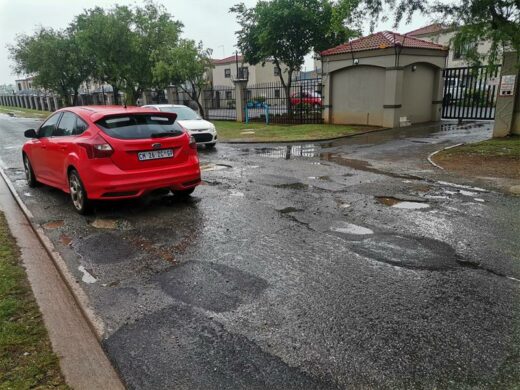 Pothole-riddled road