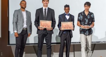 Four sportsmen receiving their accolades.