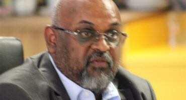 An Indian man in a suit