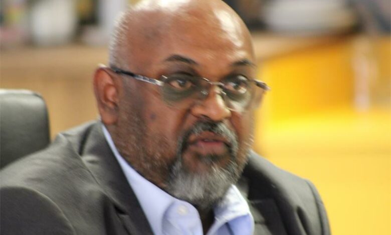 An Indian man in a suit