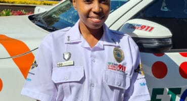 Black woman in her uniform.