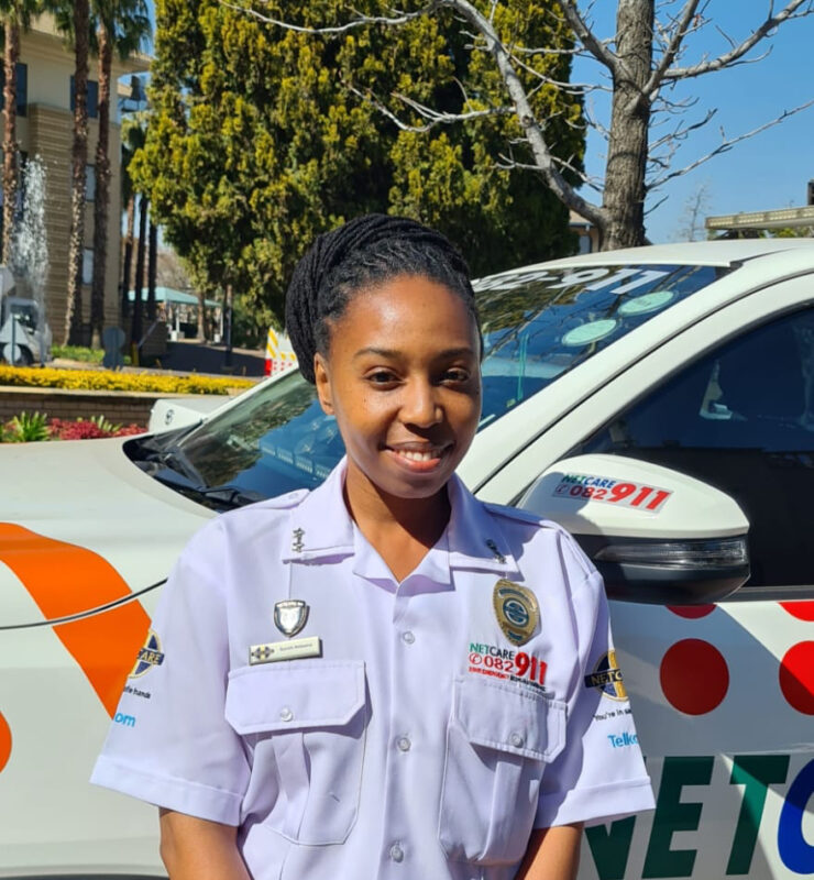 Black woman in her uniform.