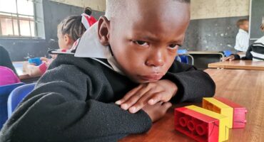 Crying schoolboy child in his first day of school