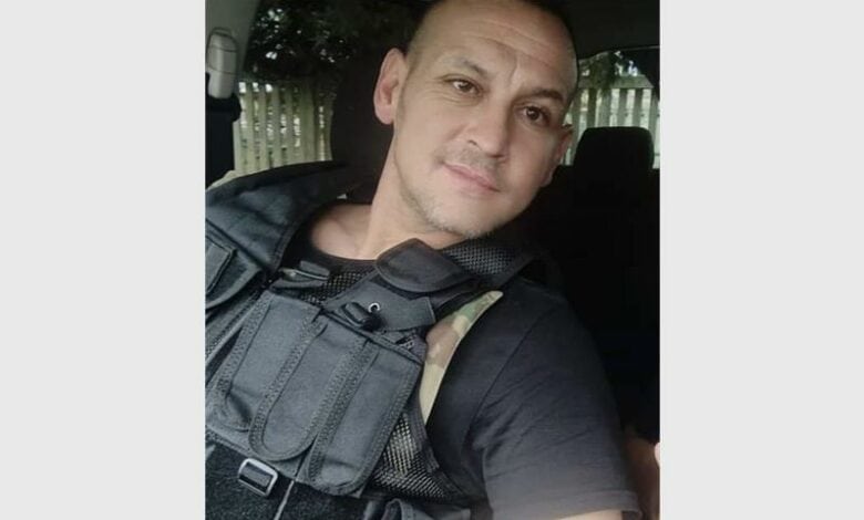 A photo of a man in protective gear