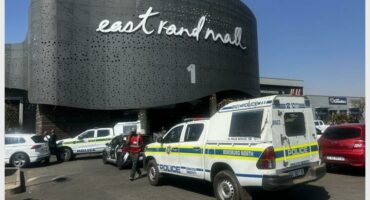 a police van outside a shopping mall