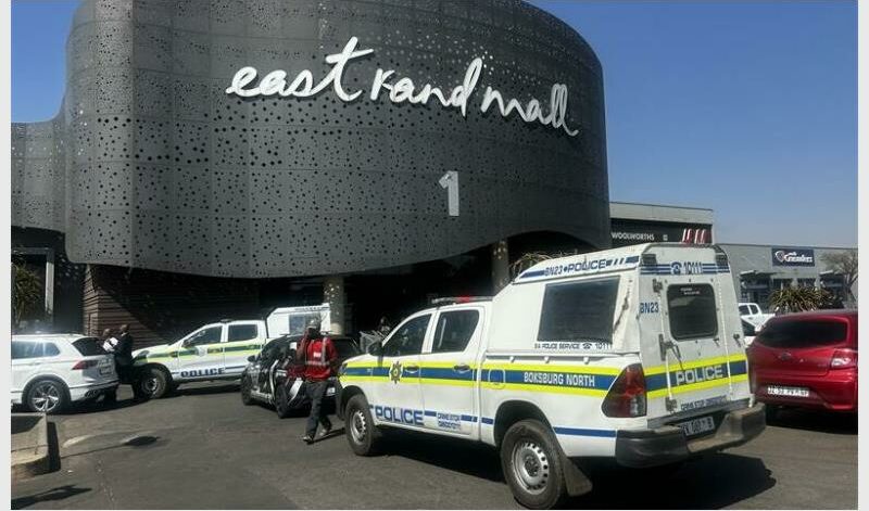 a police van outside a shopping mall