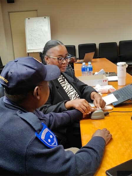 a police officer and an official from a private forensic company.