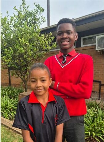 Thato Khoza and Adaobi from Van Dyk Primary impress at the D6 Athletics at Germiston Stadium.