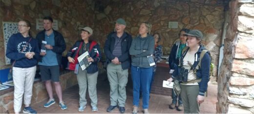 a group of people both men and women standing