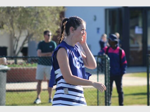 Girl in netball attire 