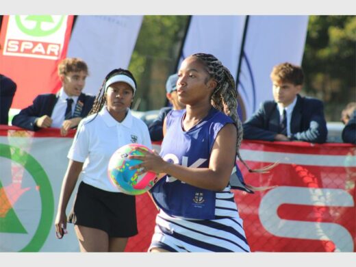 Girls in netball attire 