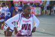 a girl in her netball attire