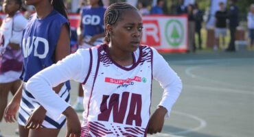 a girl in her netball attire