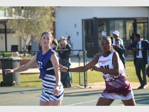 Girls in netball attire 
