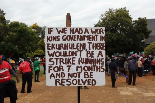 'If we had a working government, this strike wouldn’t be running seven months,' reads one of the protesters' sign.