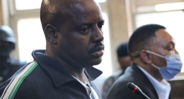 two accused men in the dock