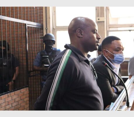 two accused men in the dock