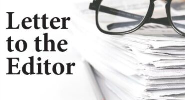 A black and white image depicting a stack of papers with a pair of reading glasses on top of the pile and a pencil next to the papers with the wording Letter to the Editor.