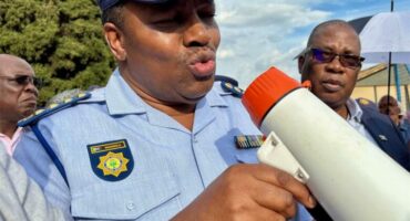 A POLICEMAN IN FULL UNIFORM