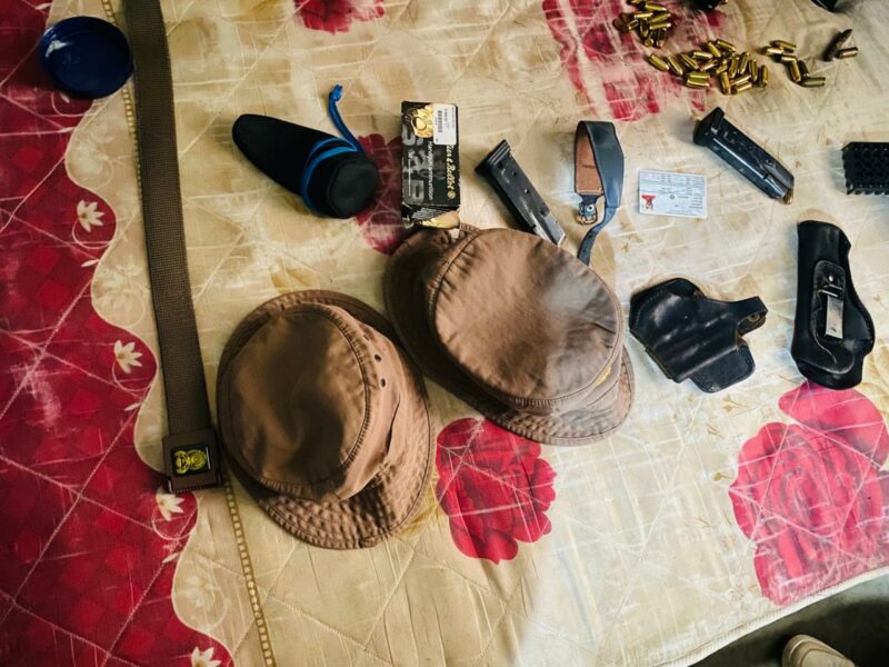 A correctional services uniform and loaded magazines