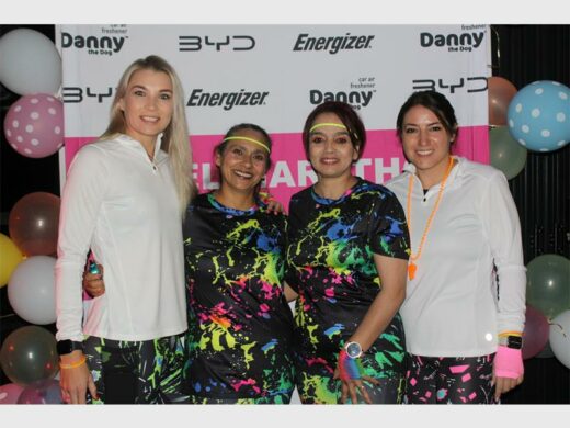 a group of women in colourful clothing 