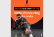 A poster advertising the Pendoring Awards, using an orange background with white writing and an image of a young black male crouching and looking at the camera.